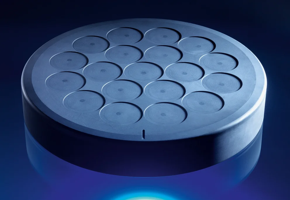 Graphite component with multiple circular recesses used in high‑temperature processing
