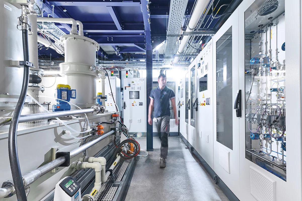 Technician working in a high-tech semiconductor manufacturing facility